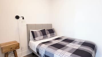 Desk, laptop workspace, blackout curtains, iron/ironing board