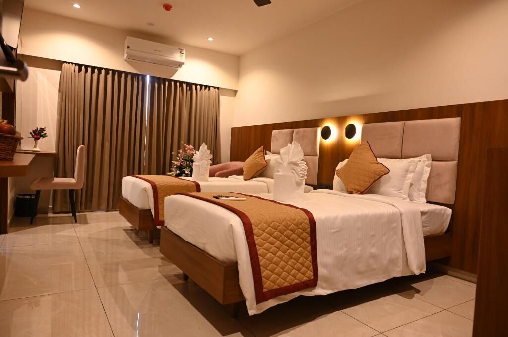Double or Twin Room, City View | In-room safe, soundproofing, free WiFi, bed sheets
