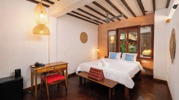 Comfort Suite, Garden View | Minibar, in-room safe, blackout drapes, soundproofing