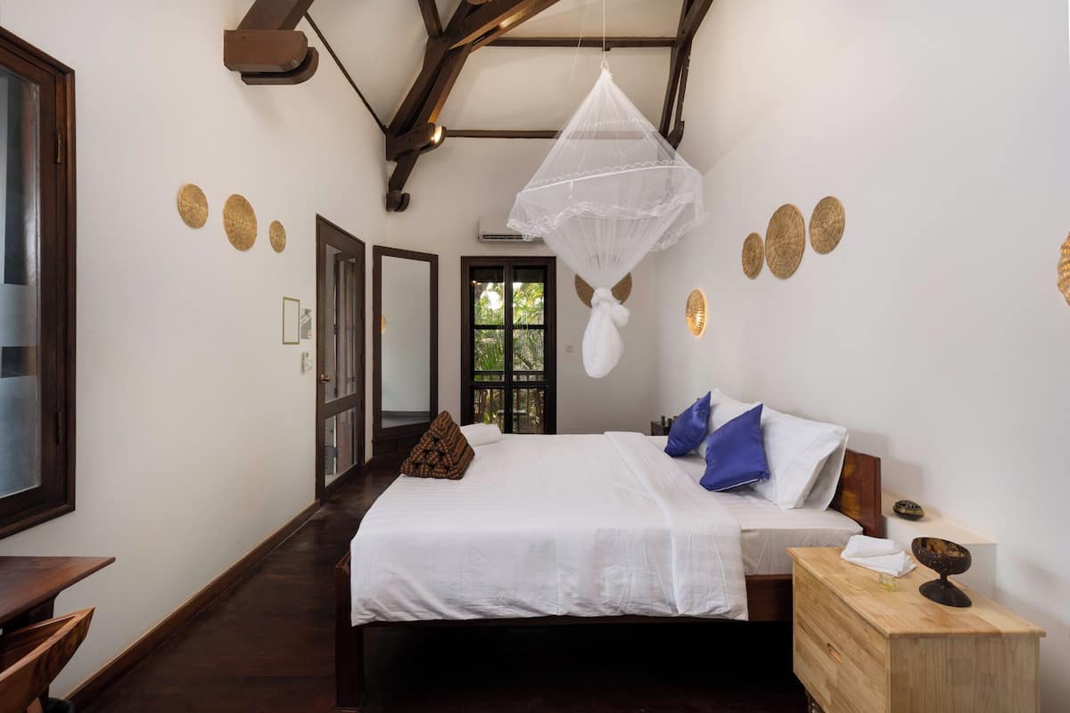 Deluxe Suite, Garden View | In-room safe, blackout drapes, soundproofing, free WiFi