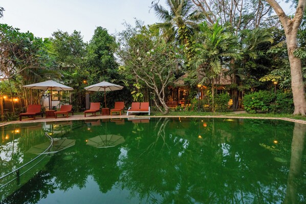 Outdoor pool, pool umbrellas, sun loungers