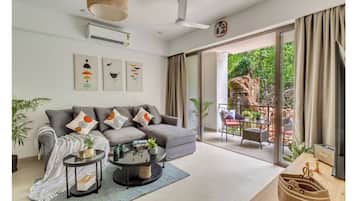 Apartamento | Zona de estar | Smart TV de 32 pulgadas con canales digitales