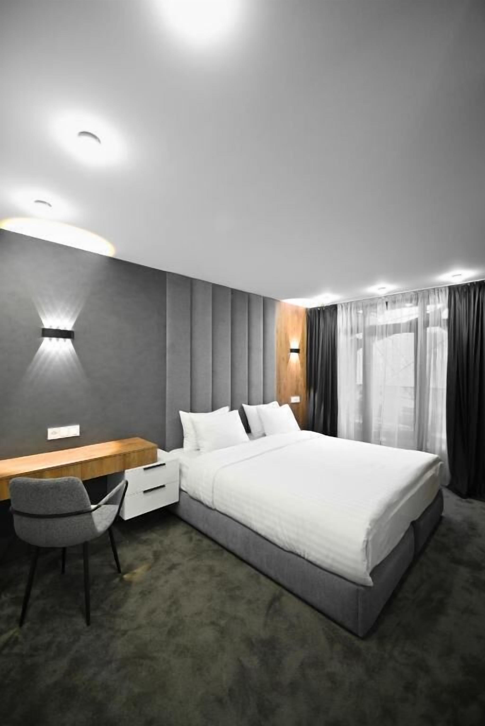 デラックス ダブルまたはツインルーム バルコニー シティビュー | セーフティボックス (室内)、防音設備、アイロン / アイロン台、WiFi (無料)