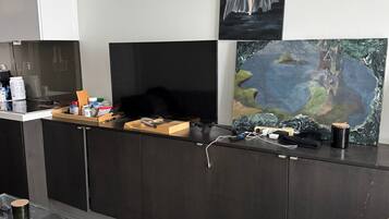 Family Suite, City View | Private kitchen | Full-sized fridge, microwave, oven, stovetop