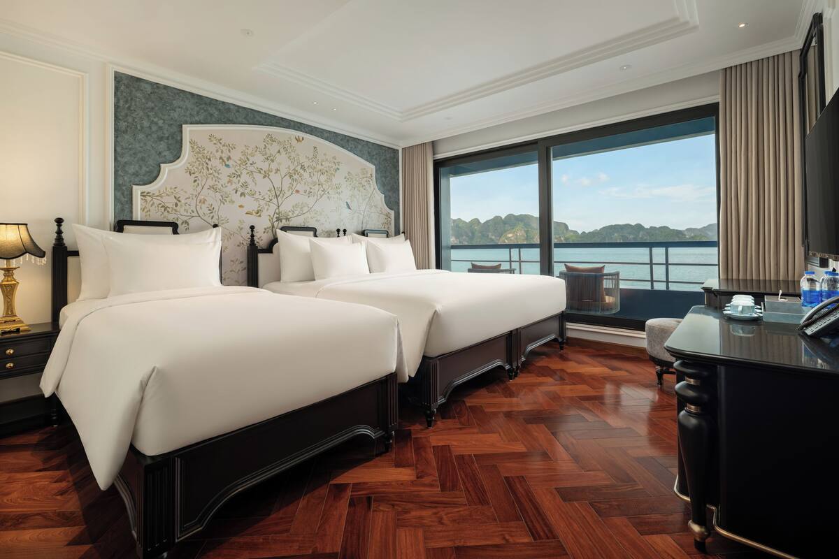 Family Triple Room, Balcony, Ocean View | Minibar, desk