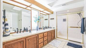 Shower, hair dryer, towels, soap