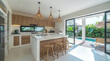 Family Villa, Pool View | Private kitchen | Fridge, microwave, coffee/tea maker, electric kettle