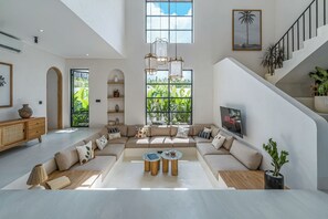 Family Villa, Pool View | Living area | Flat-screen TV - Sunbeam Oasis (Munggu)