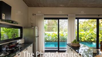 Villa, Balcony, Pool View | Private kitchen