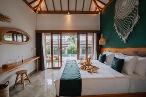 Deluxe Bungalow, Pool View | In-room safe, blackout drapes, iron/ironing board, free WiFi - EHOA NYANYI BEACH Boutique Hotel (Beraban)