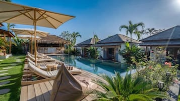 Outdoor pool, open 7:00 AM to 10:00 PM, pool umbrellas, sun loungers