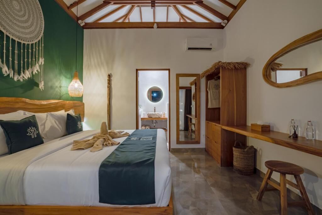 Deluxe Bungalow, Pool View | In-room safe, blackout drapes, iron/ironing board, free WiFi