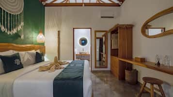 Deluxe Bungalow, Pool View | In-room safe, blackout drapes, iron/ironing board, free WiFi