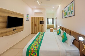 Deluxe Double Room | Soundproofing - Treebo The Velvet (Gandhinagar)