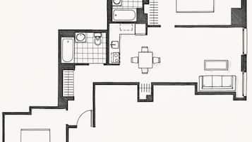 A floor plan with a kitchen, dining area, two bedrooms, and a bathroom.