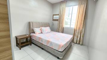 Desk, laptop workspace, free WiFi, bed sheets