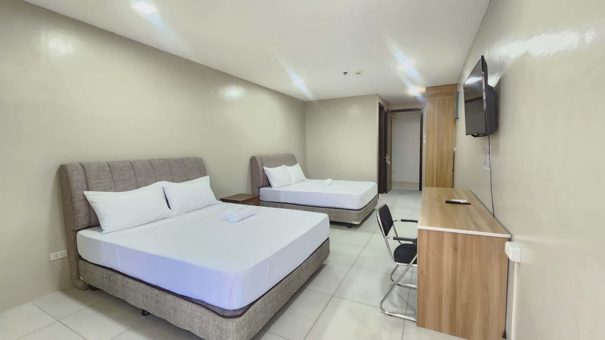 Desk, laptop workspace, free WiFi, bed sheets