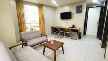 32-inch flat-screen TV with cable channels