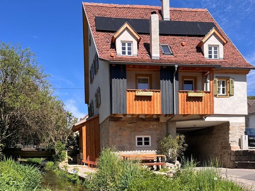 Holiday Home in Jagst Valley: Gerbertor – Stay in a Historic Landmark with Meadow and Stream