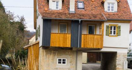 Holiday Home in Jagst Valley: Gerbertor – Stay in a Historic Landmark with Meadow and Stream