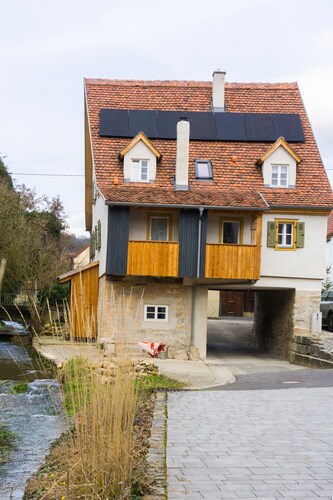 Holiday Home in Jagst Valley: Gerbertor – Stay in a Historic Landmark with Meadow and Stream