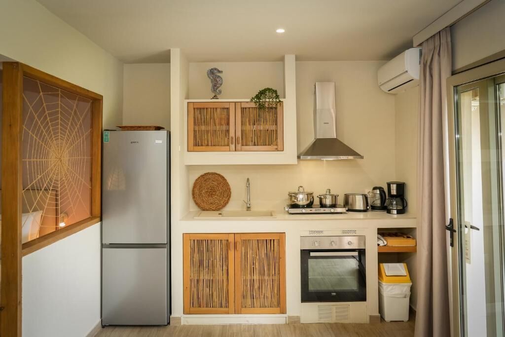 Suite familiar, vistas al mar | Cocina privada