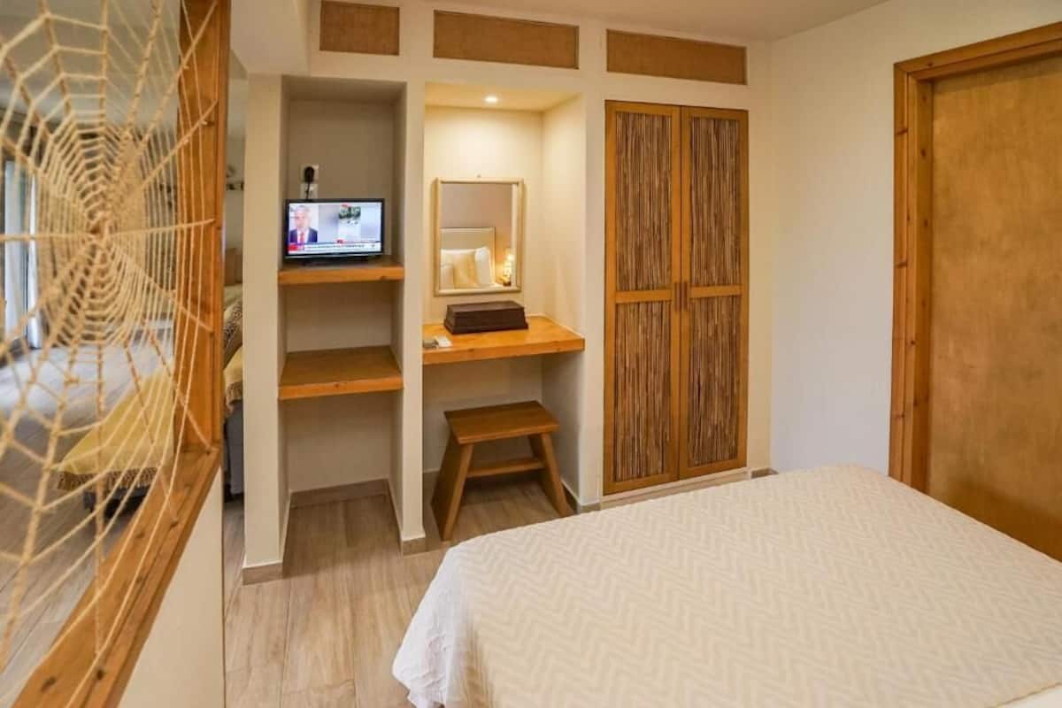 Family Suite, Sea View | In-room safe, soundproofing, iron/ironing board