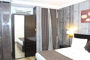 Deluxe Room, Balcony, City View | Desk, laptop workspace, blackout drapes, soundproofing - Oxygen Orbis Hotel (Ibadan)