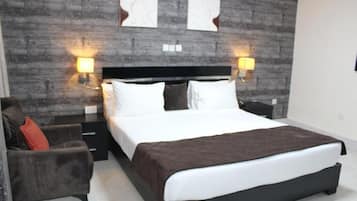 Deluxe Room, Balcony, City View | Desk, laptop workspace, blackout drapes, soundproofing