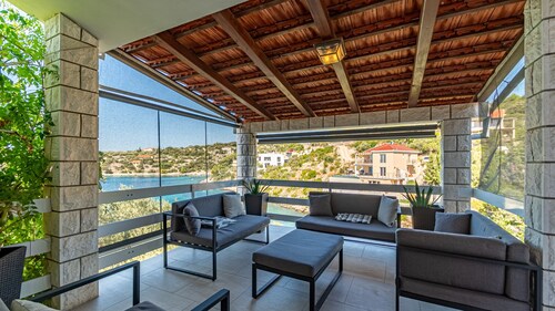 Seafront Villa Naty by Villas Guide