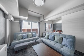 Family Apartment | Living area | 50-inch flat-screen TV with cable channels - MP STYLE SAPPORO-50 (Sapporo)