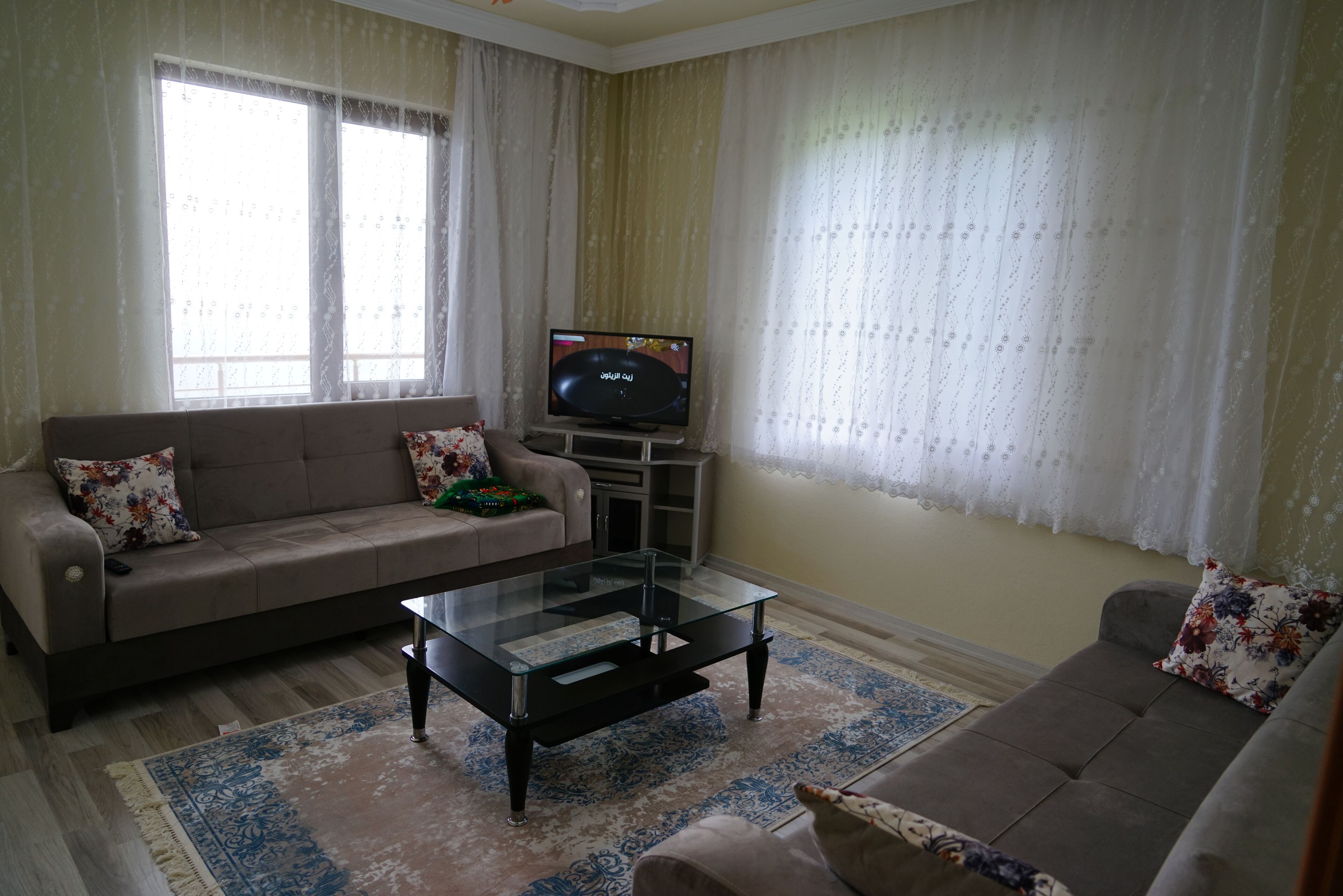 Family Suite, Lake View | Living area | TV