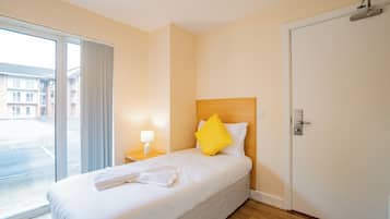 4 dormitorios, tabla de planchar con plancha, wifi y ropa de cama