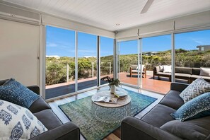 TV, fireplace - Nalu Retreat  Spacious Coastal Beach House (Saint Andrews Beach)
