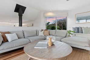 TV, fireplace - Nalu Retreat  Spacious Coastal Beach House (Saint Andrews Beach)