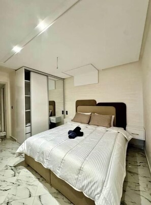 2 slaapkamers, een strijkplank/strijkijzer, wifi, beddengoed