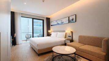 Premium Studio, Partial Ocean View | Desk, laptop workspace, free WiFi, bed sheets