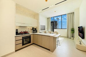 Departamento, balcón, vista a la ciudad | Cocina privada