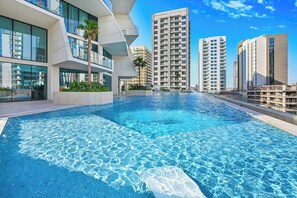 Outdoor pool - Bloomfields Iconic 1BR Binghatti Phanto (Dubai)