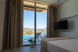 Junior Suite, Private Pool, Sea View | In-room safe, blackout drapes, soundproofing, iron/ironing board