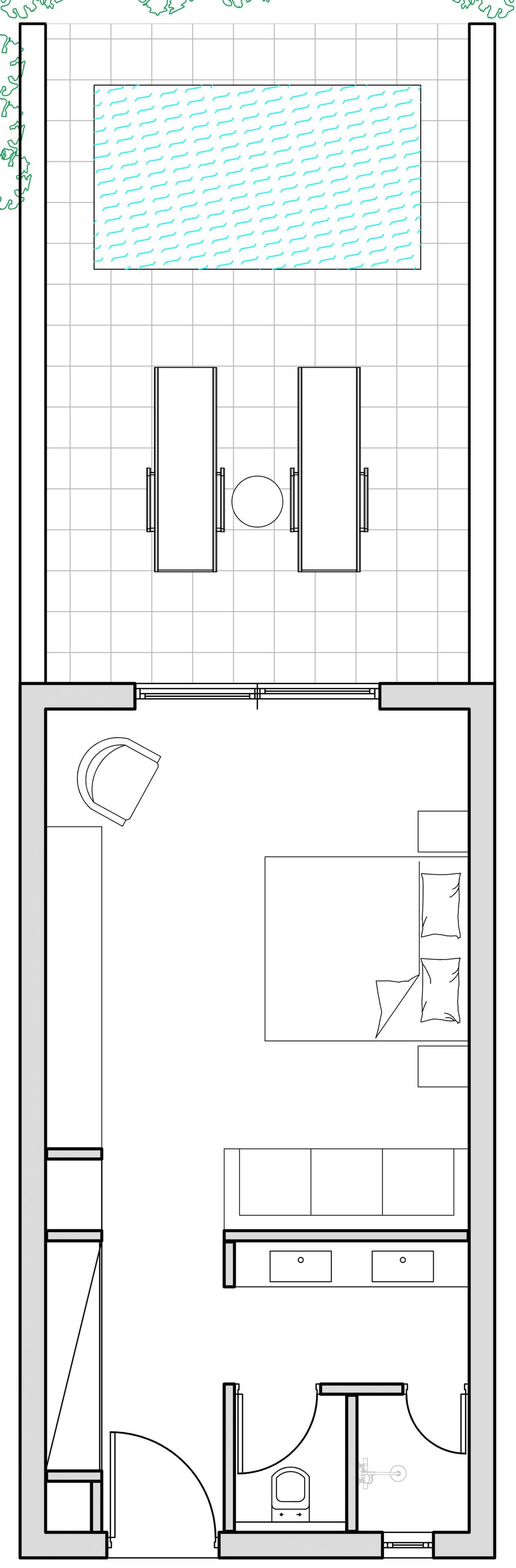 A floor plan with a kitchen, two bedrooms, a bathroom, and a small outdoor area.