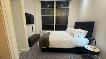2 habitaciones, tabla de planchar con plancha, wifi y ropa de cama
