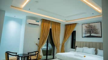 In-room safe, desk, laptop workspace, blackout curtains