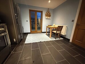 Shared Dormitory, 1 Bedroom, Fireplace, Garden View | Dining