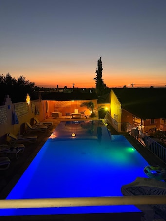 Outdoor pool. Domaine JJ