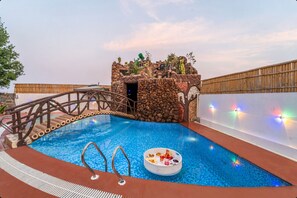 Outdoor pool - ELIVAAS Echoes by the Aravali 5BHK villa (Bassi)