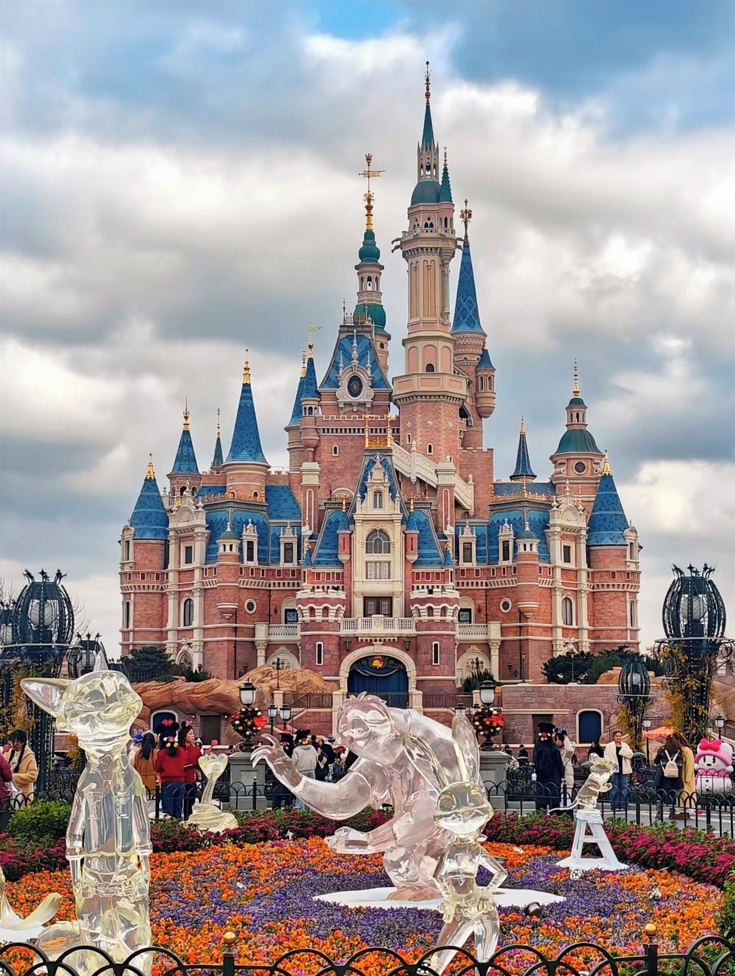 A large castle-like building with multiple towers and a central entrance.