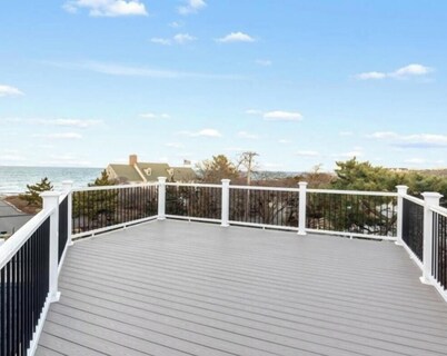 Beautiful 4 bedroom ocean view beach escape! AC, roofdeck, newly renovated.