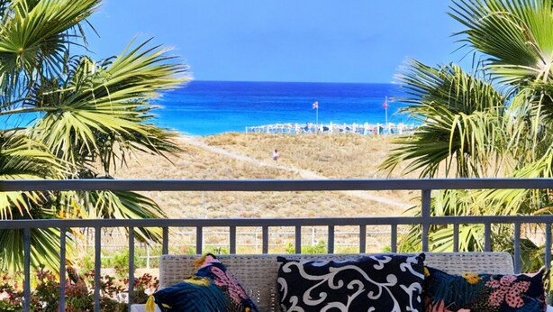 A balcony with a view of the beach and ocean. - FRUIT VILLAGE DIAMANTE Dominicus (Grisolia)