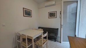 Apartment, 2 Bedrooms, Garden View | Dining room - Beachside Apartment in Rosolina Mare (Rosolina)